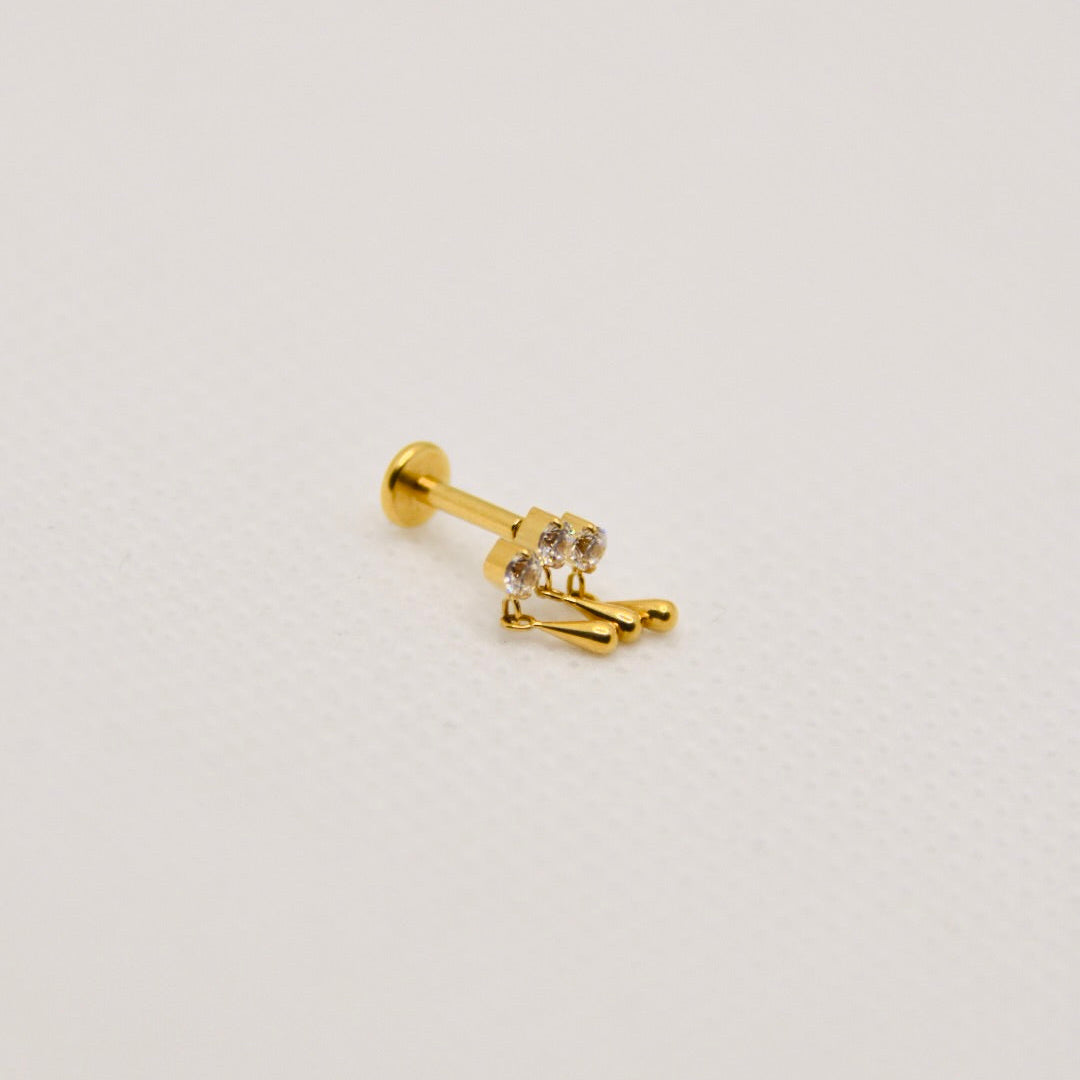 Météore — dangle triple zirconium, titane ASTM F136 doré | hélix, tragus | ÖVA