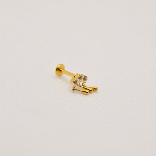 Météore — dangle triple zirconium, titane ASTM F136 doré | hélix, tragus | ÖVA