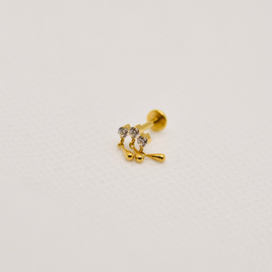 Météore — dangle triple zirconium, titane ASTM F136 doré | hélix, tragus | ÖVA