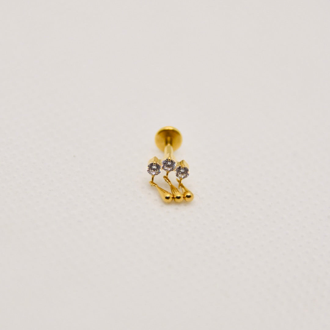Météore — dangle triple zirconium, titane ASTM F136 doré | hélix, tragus | ÖVA