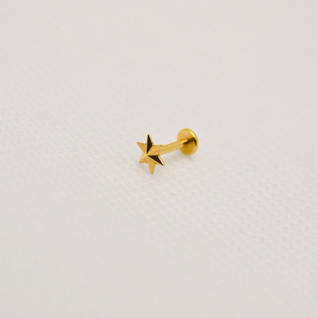 Sirius — stud étoile à six branches, titane ASTM F136 doré | hélix, tragus | ÖVA